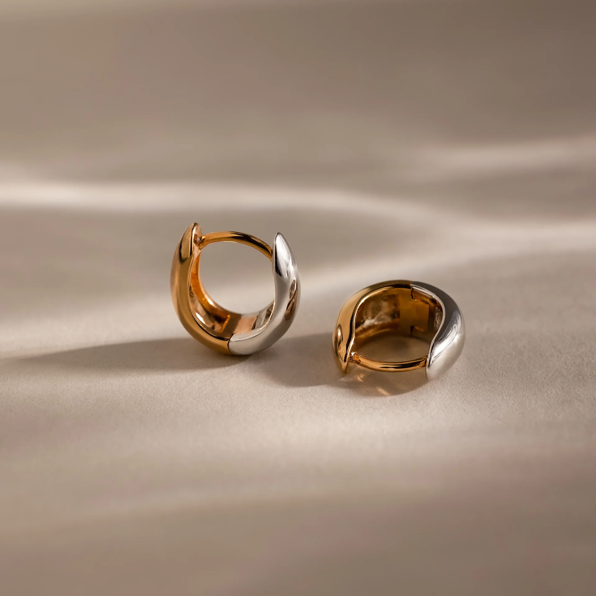 Bold Mixed Metal Huggies - Image 3