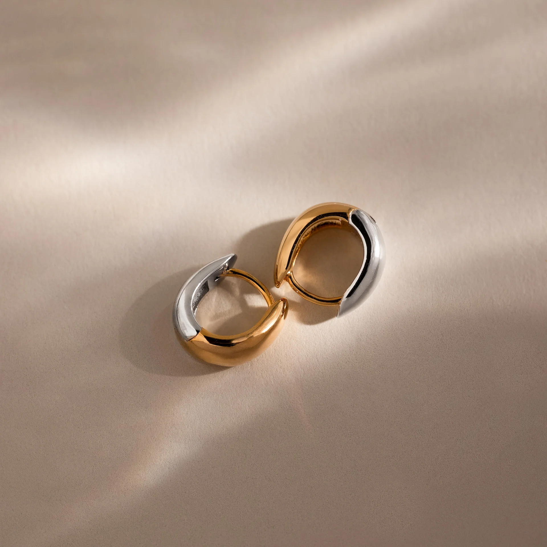 Bold Mixed Metal Huggies - Image 7