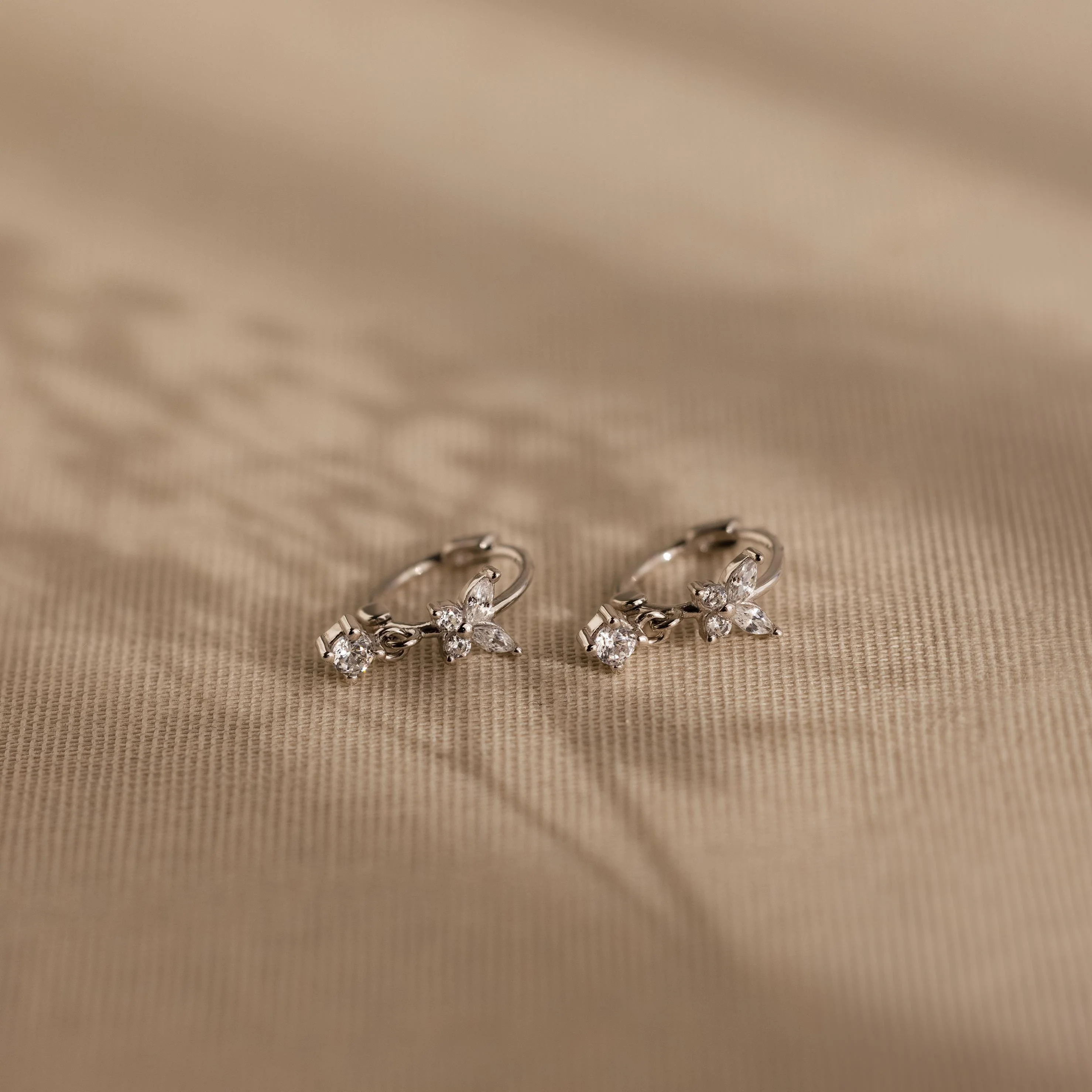 Butterfly Drop Huggies in Silver