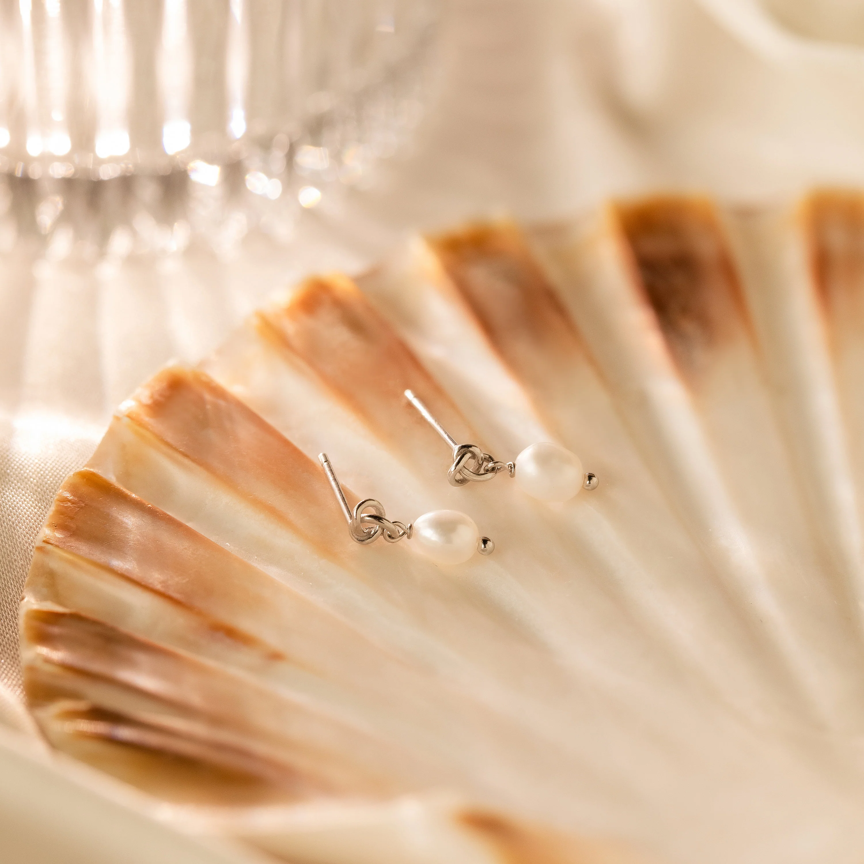 Dainty Knot Pearl Earrings - Image 6