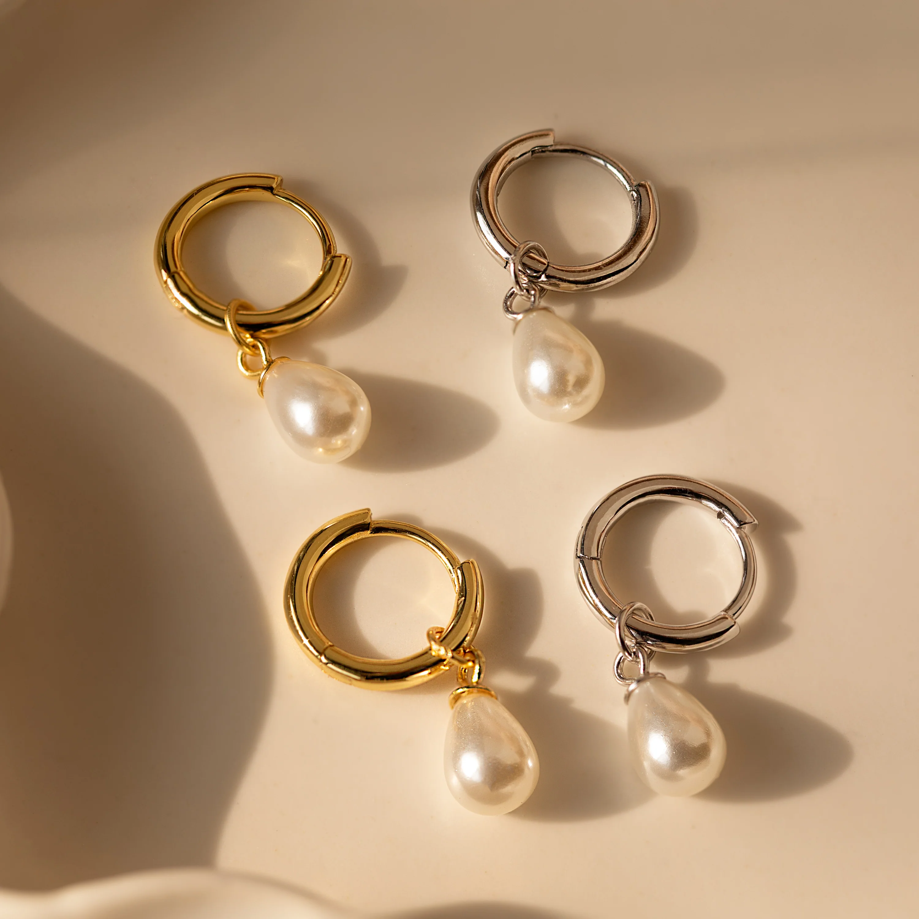Dainty Pearl Drop Huggies in Silver - Image 3