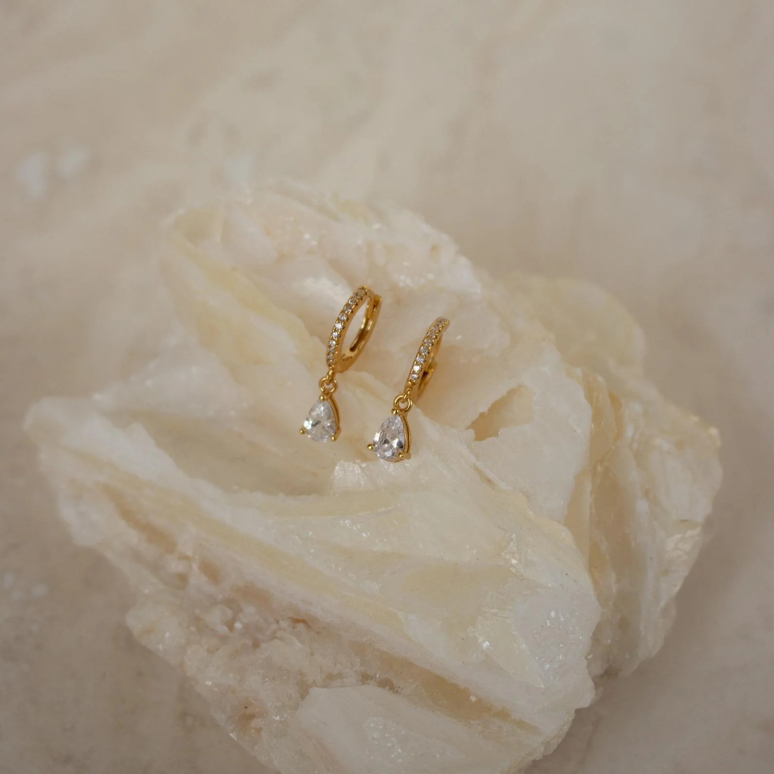 Diamond Drop Huggies in 18K Gold - Image 3