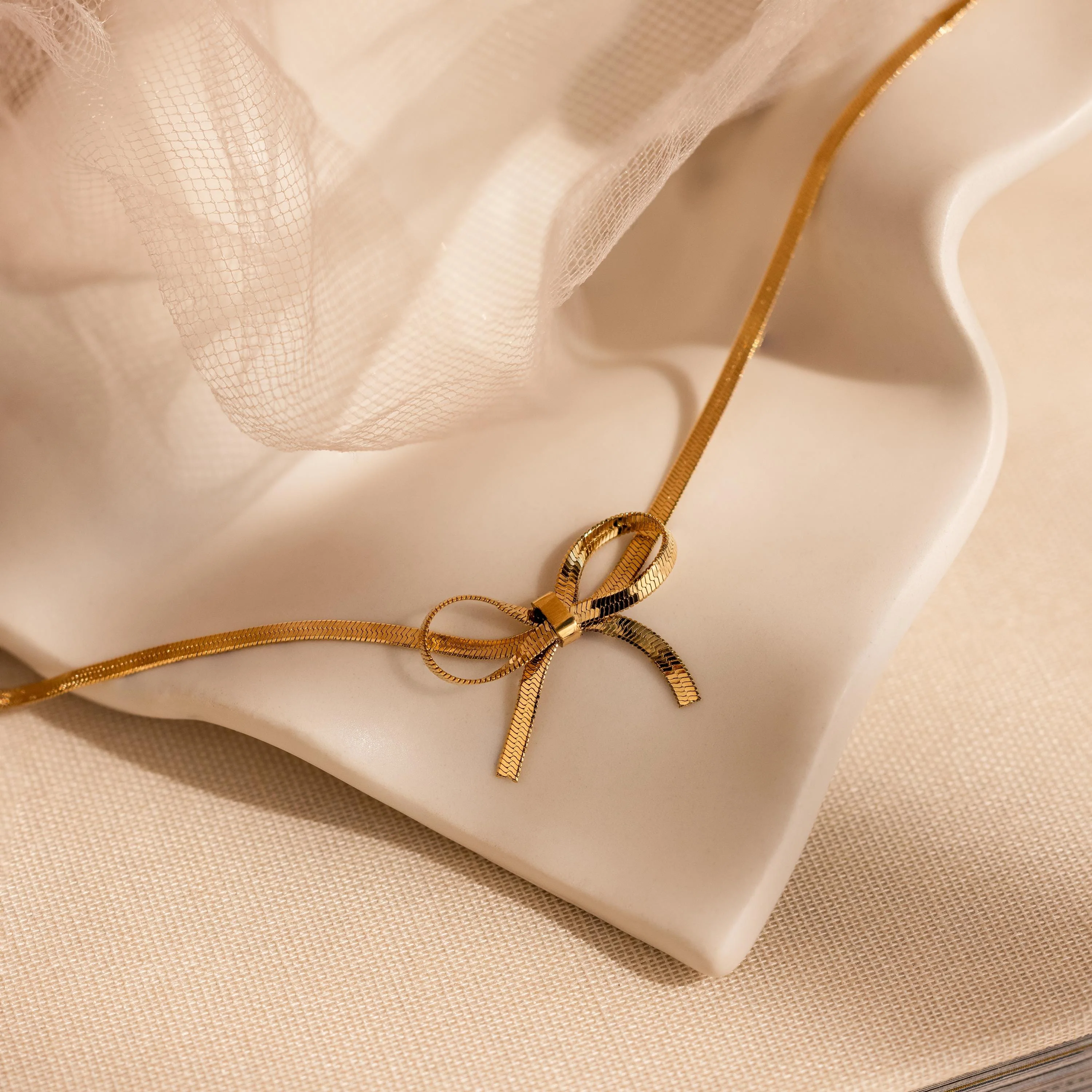 Herringbone Bow Necklace in 18K Gold - Image 6