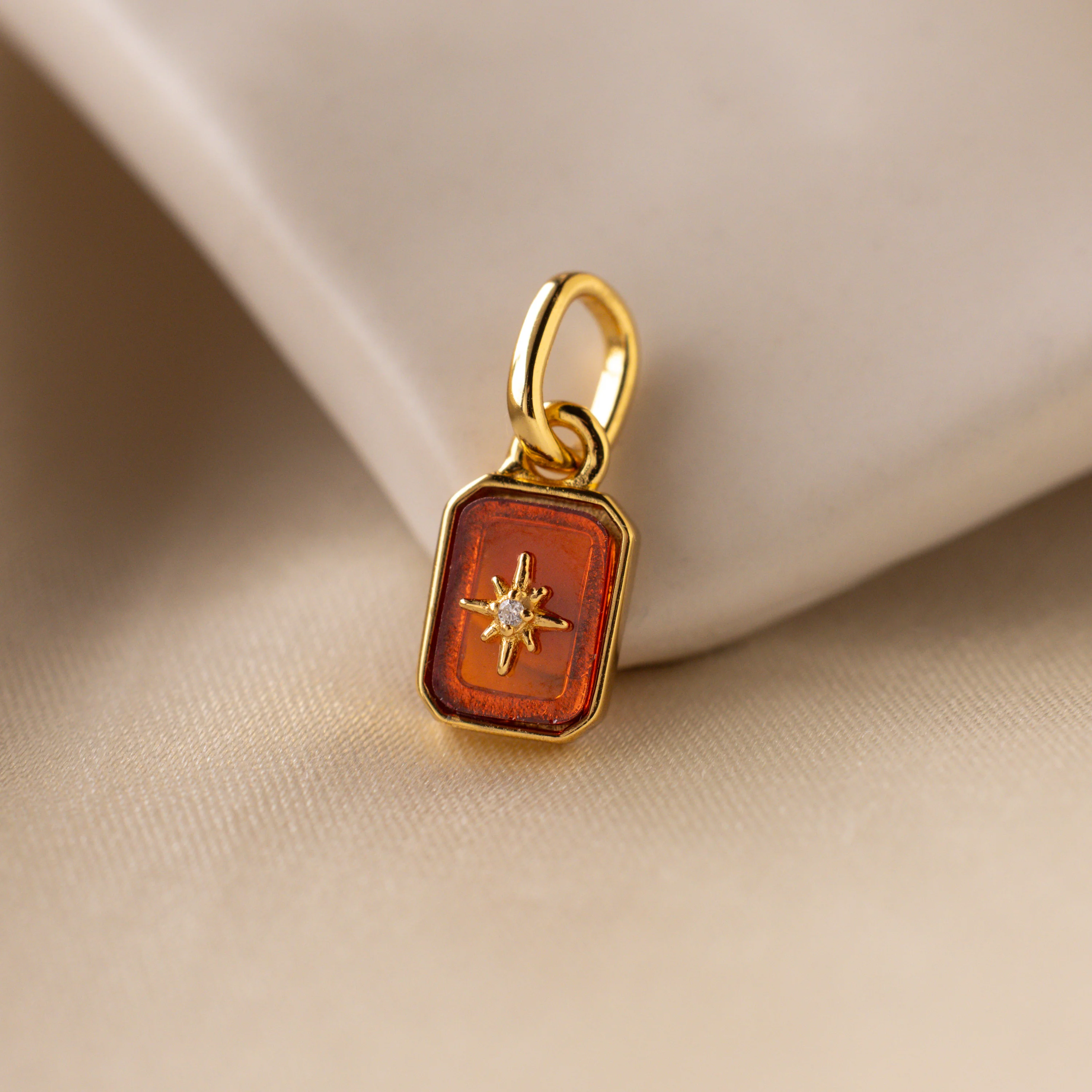 North Star Garnet Charm