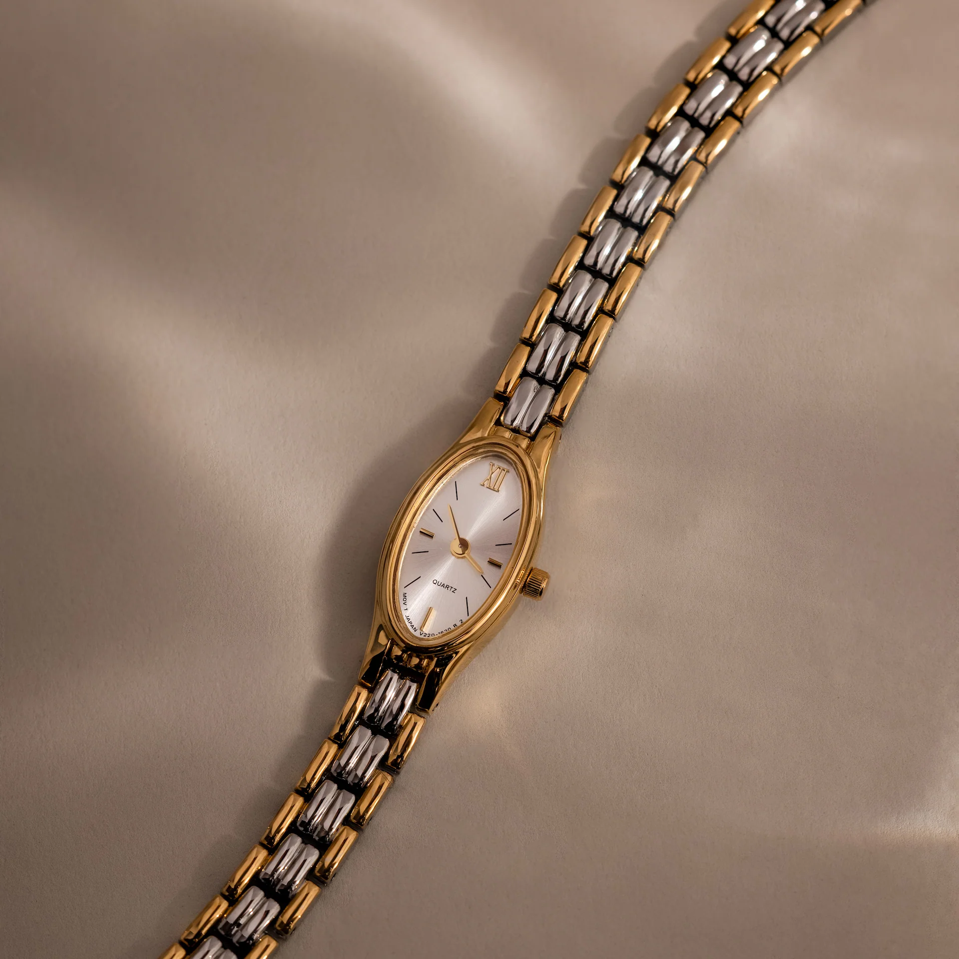 Slim Oval Timepiece in Mixed Metal - Image 3
