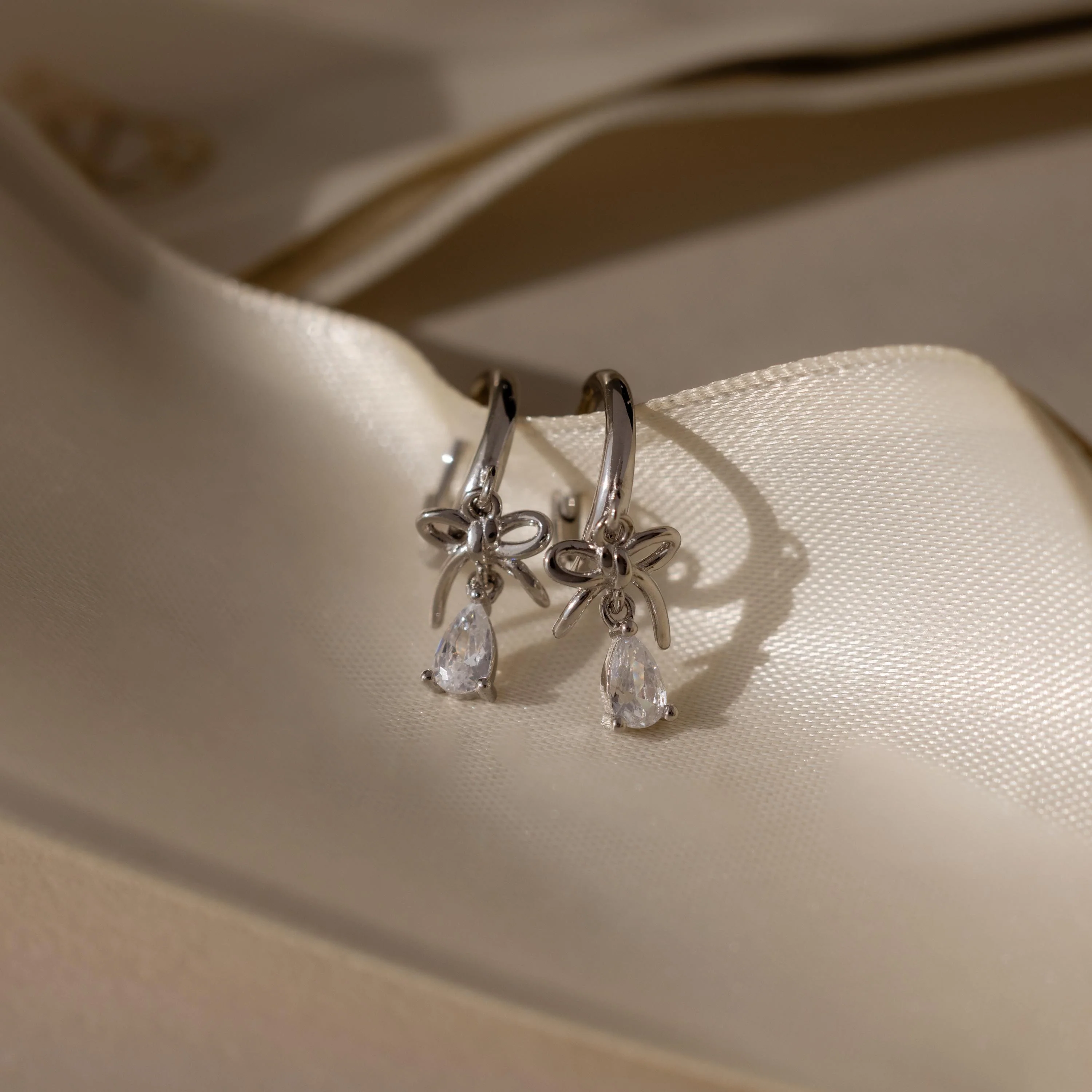 Teardrop Ribbon Charm Hoops in Silver - Image 3